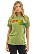 OUTSIDE LANDS 2025 CREW TEE - JUNGLE GREEN