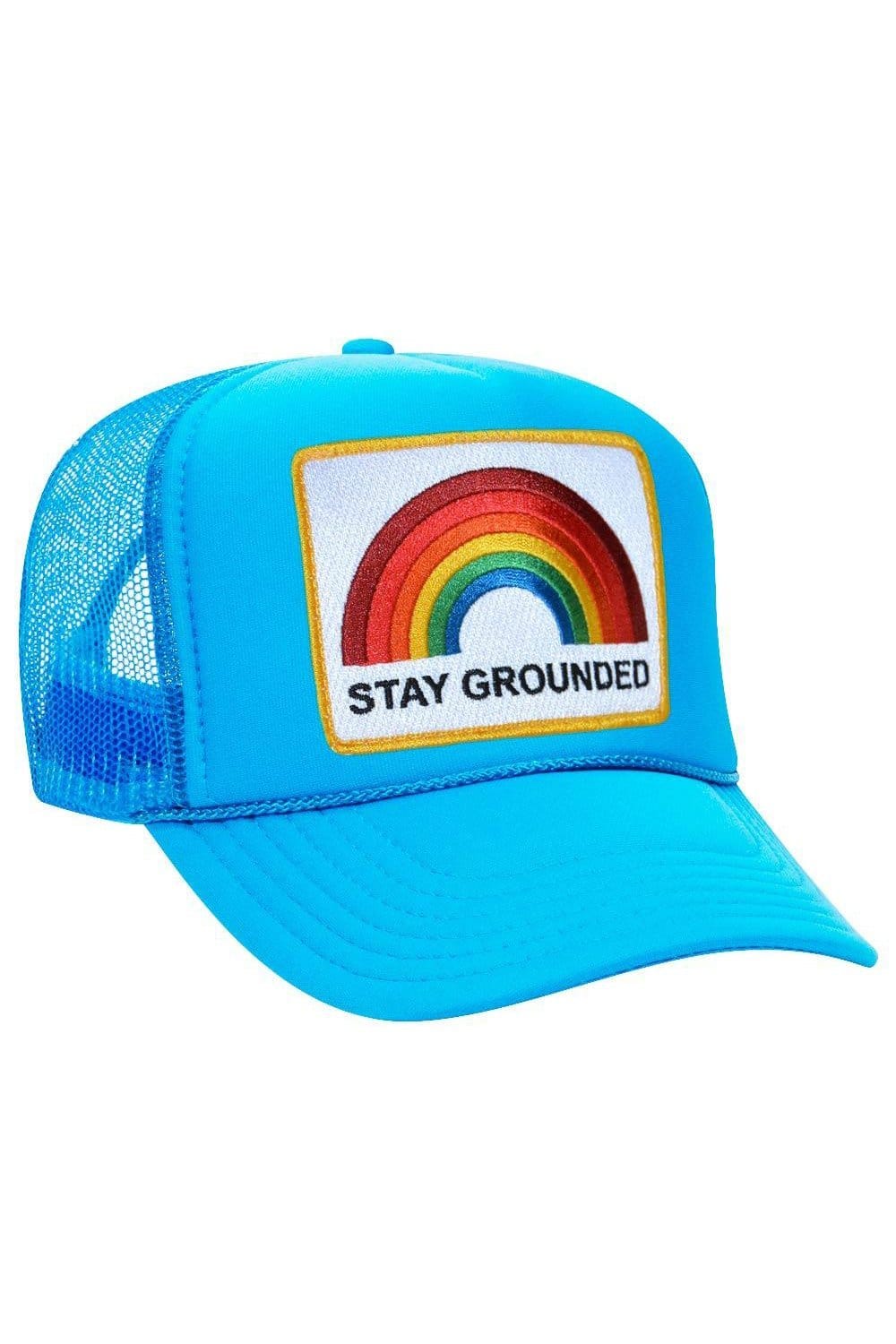STAY GROUNDED TRUCKER HAT